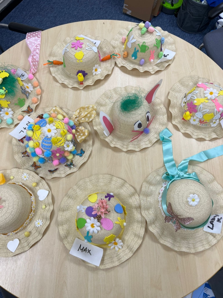A table full of entries to the Easter bonnet competition. 